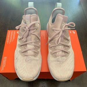 Nike light pink running shoe size 10